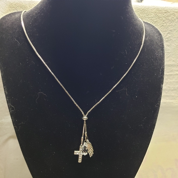 Beautiful silver tone small snake pattern necklace with a wing, a cross, bead - Picture 9 of 9
